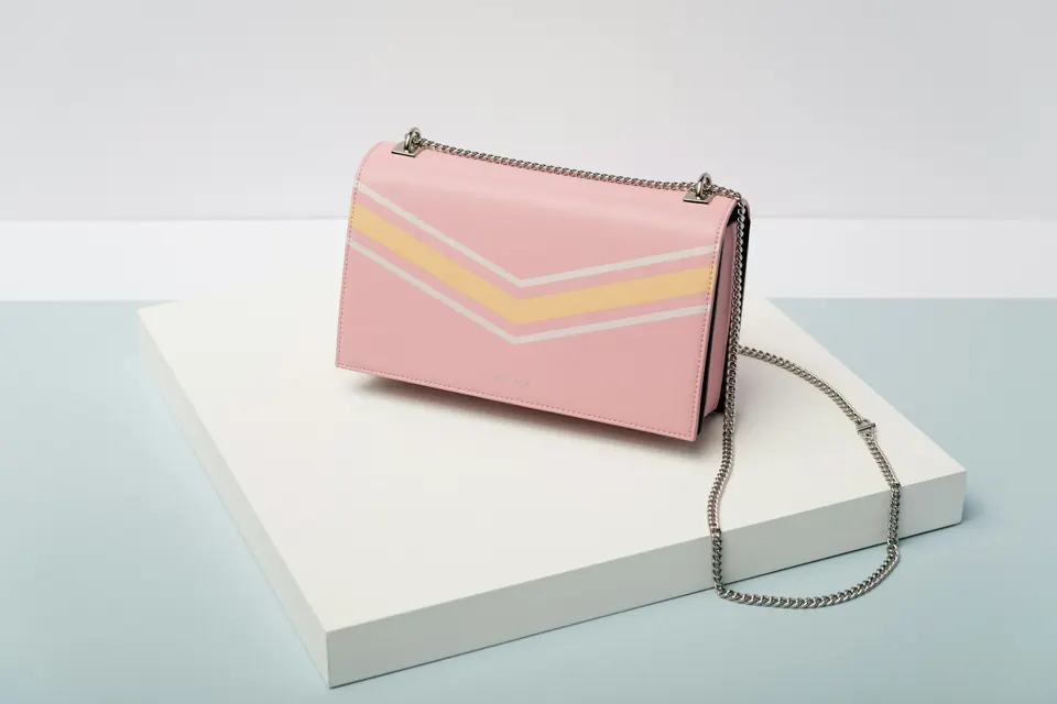 Pink sling bag with chain strap